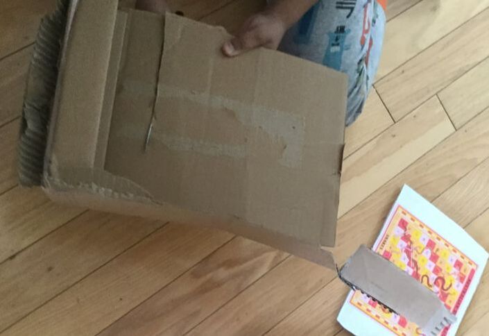 cutting cardboard into a square board