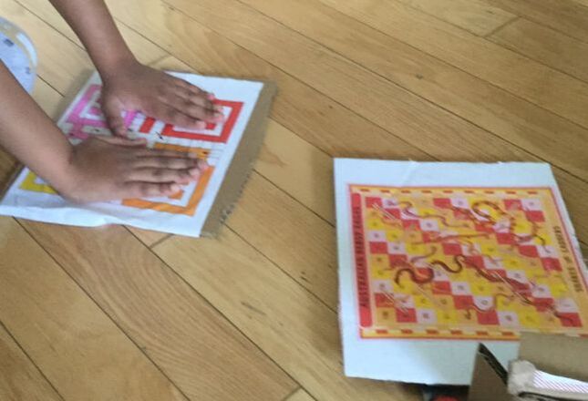 sticking paper on a cardboard 